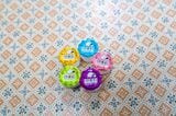 象のイラストが懐かしいヨーグルト風の駄菓子「モロッコヨーグル」。容器の形状は、発売当時からずっと同じだ（写真：筆者撮影）