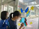 うるま市立あげな中学校では、心地よい環境づくりの実現の手立てとして、生徒たちは校舎に絵を描いた